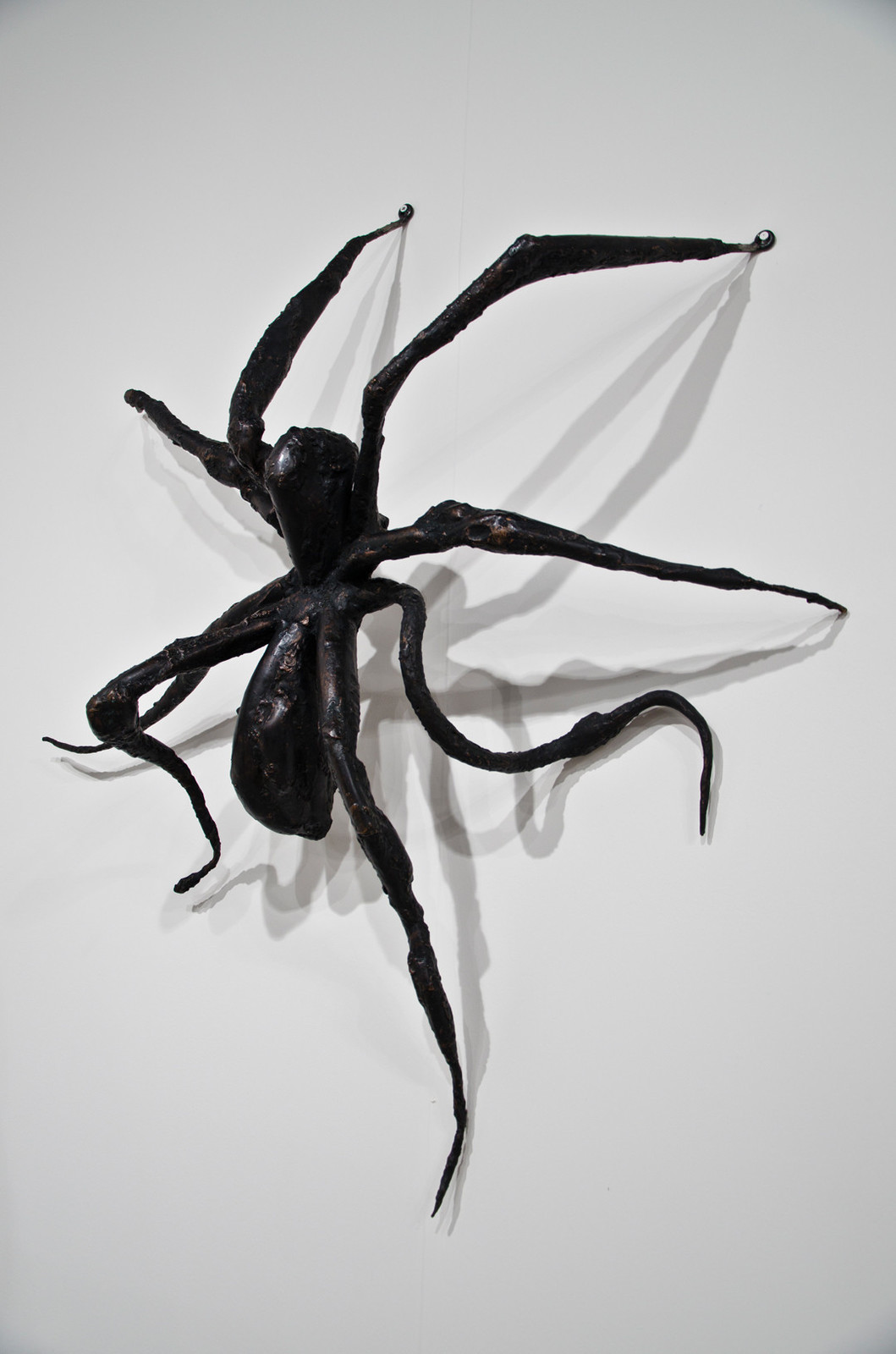 Louise Bourgeois. Spider 1. 1995. Bronze, dark and polished patina, wall piece, ed. 1/6. 127 х 116.84 х 63,50 cm. &copy; Robert Miller Gallery