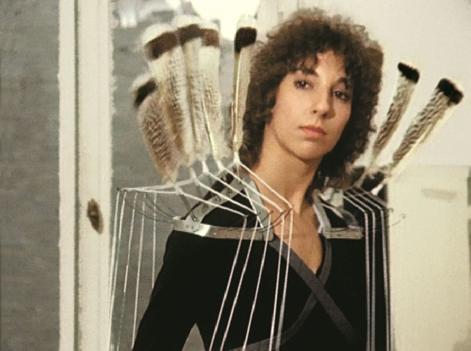 Rebecca Horn. Feathers Dancing on Shoulders. 1974&ndash;1975. Metal, threads, feathers. Private collection of Rebecca Horn.