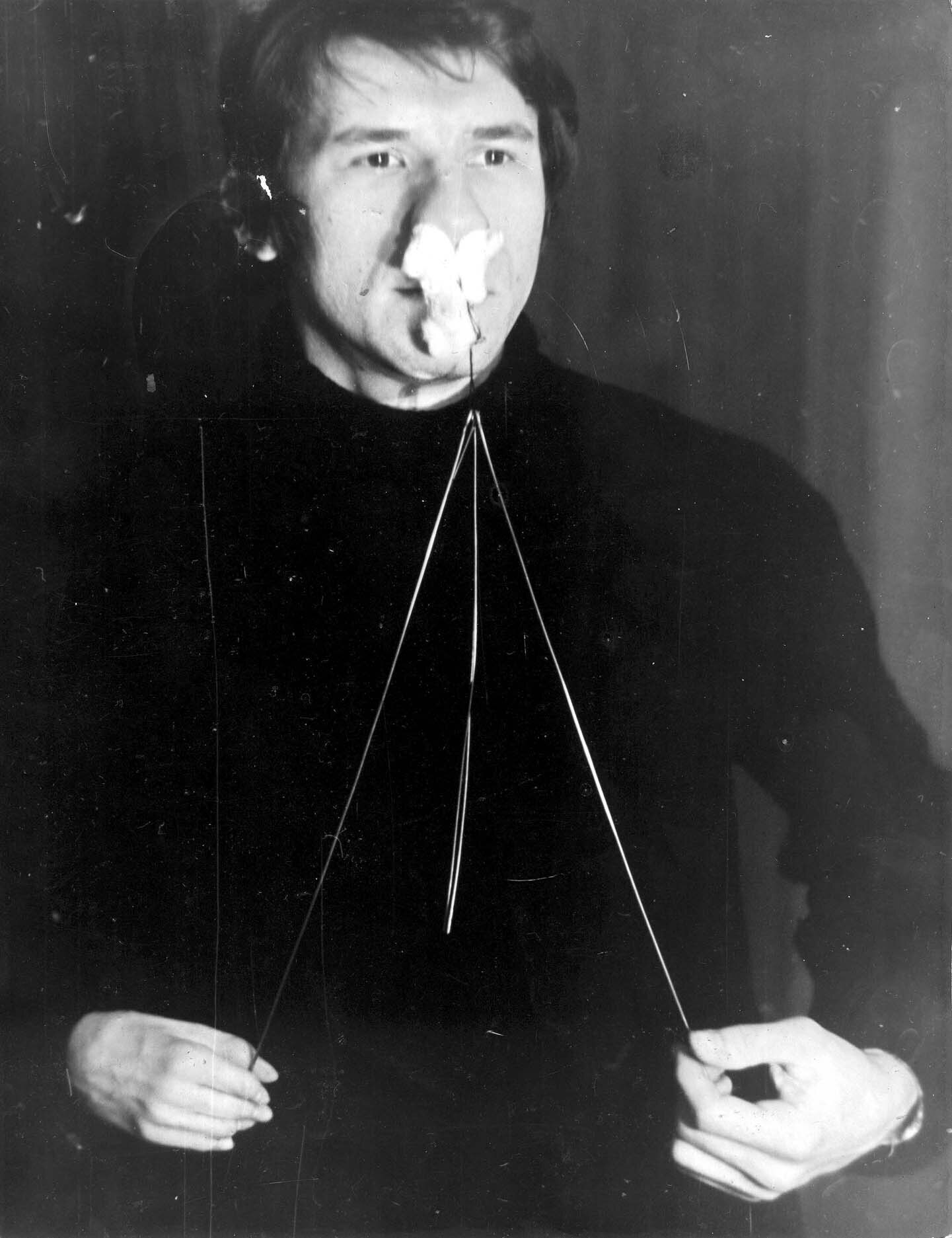 Viktor SkersisBooks, 1981B is a book; it opens wide.O is the eye of the needle; a thread goes through it.O is the owner; he keeps the book.K is to kindle; thus starts a flickering fire.S is a scent; it makes nostrils expand.I myself struggle to understand this work, but it appears to be built upon mistakes.