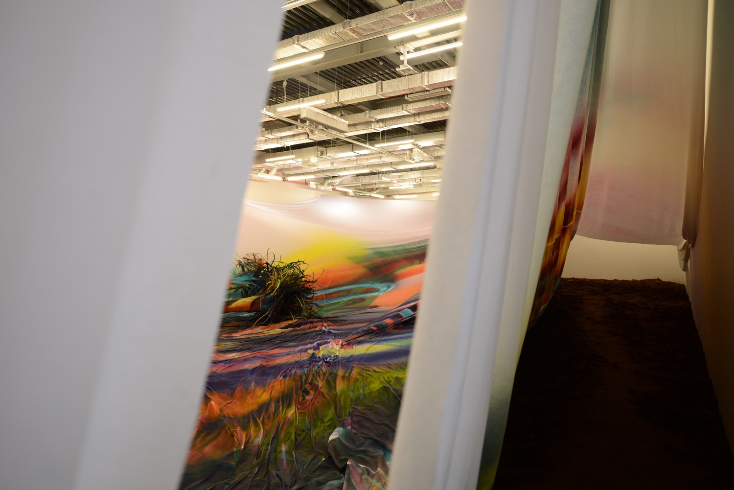 Katharina Grosse, yes no why later, 2015, acrylic on fabric, soil and trees, 550 х 4400 х 1800 cm Photo: Ilya Ivanov; &copy; Garage Museum of Contemporary Art, Katharina Grosse and VG Bild-Kunst, Bonn, 2015 Courtesy of Galerie n&auml;chst St. Stephan/ Rosemarie Schwarzw&auml;lder, Vienna and Johann K&ouml;nig, Berlin