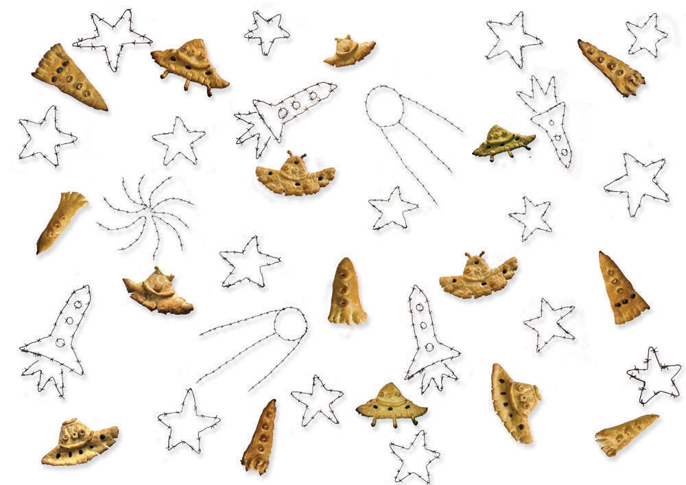 Сергей Шутов. Новый Молоховец. 2009. Инсталляция: хлебы ручной работы, колючая проволока