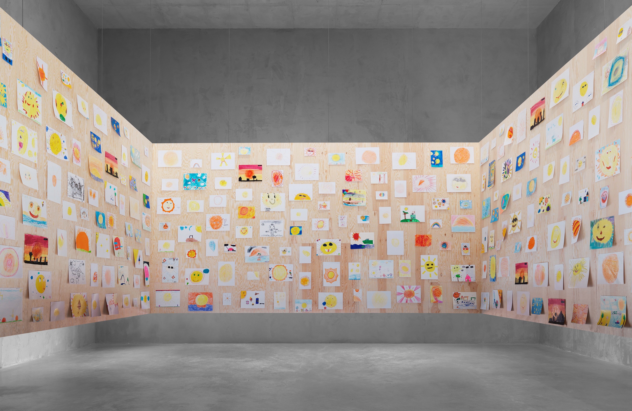 Ugo Rondinoneyour age and my age and the age of the sun, 2013Concrete, plywood, 450 sun drawings made by the children of LeuvenDimensions variableCourtesy of the artist