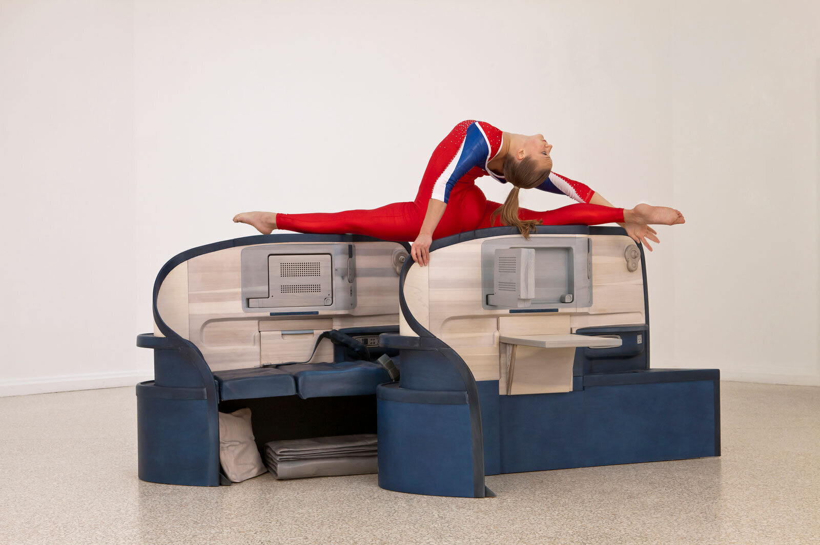 Allora & CalzadillaBody in Flight (Delta), 2011Stained wood, gymnasts (Sadie Wilhelmi, USA Gymnastics, depicted), dimensions variableInstallation view, Gloria, US Pavilion, presented by the Indianapolis Museum of Art, 54th Venice Biennale, 2011Photo: Andrew Bordwin© Allora & Calzadilla