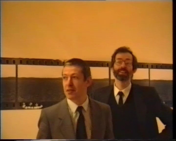 Иосиф Бакштейн и Сергей Ромашко на открытие выставки «Музей МАНИ: 40 московских художников во Франкфурте-на-Майне» в выставочном зале Karmeliterkloster, Франкфурт-на-Майне. 27 марта 1991Кадр из видеодокументацииФонд Иосифа Бакштейна, архив Музея современного искусства «Гараж»