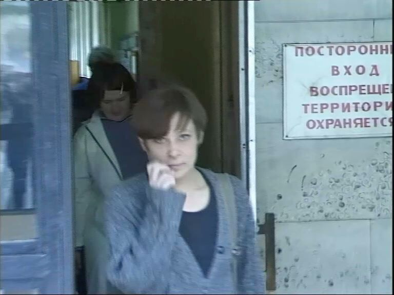 Группа «Коллективные действия». Акция «Гаражи». 29 июля 2000Кадр из видеодокументацииФонд «Художественные проекты», архив Музея современного искусства «Гараж»