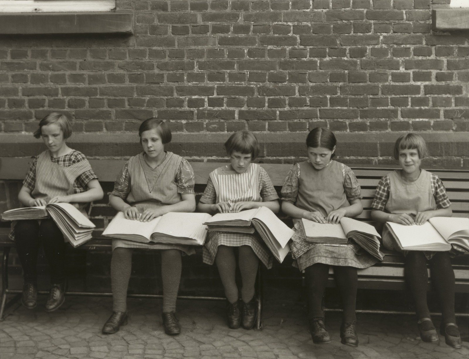August Sander, Blind Children at their Lessons, 1930. &copy; 2019 Die Photographische Sammlung / SK Stiftung Kultur - August Sander Archiv, Cologne / ARS, NY